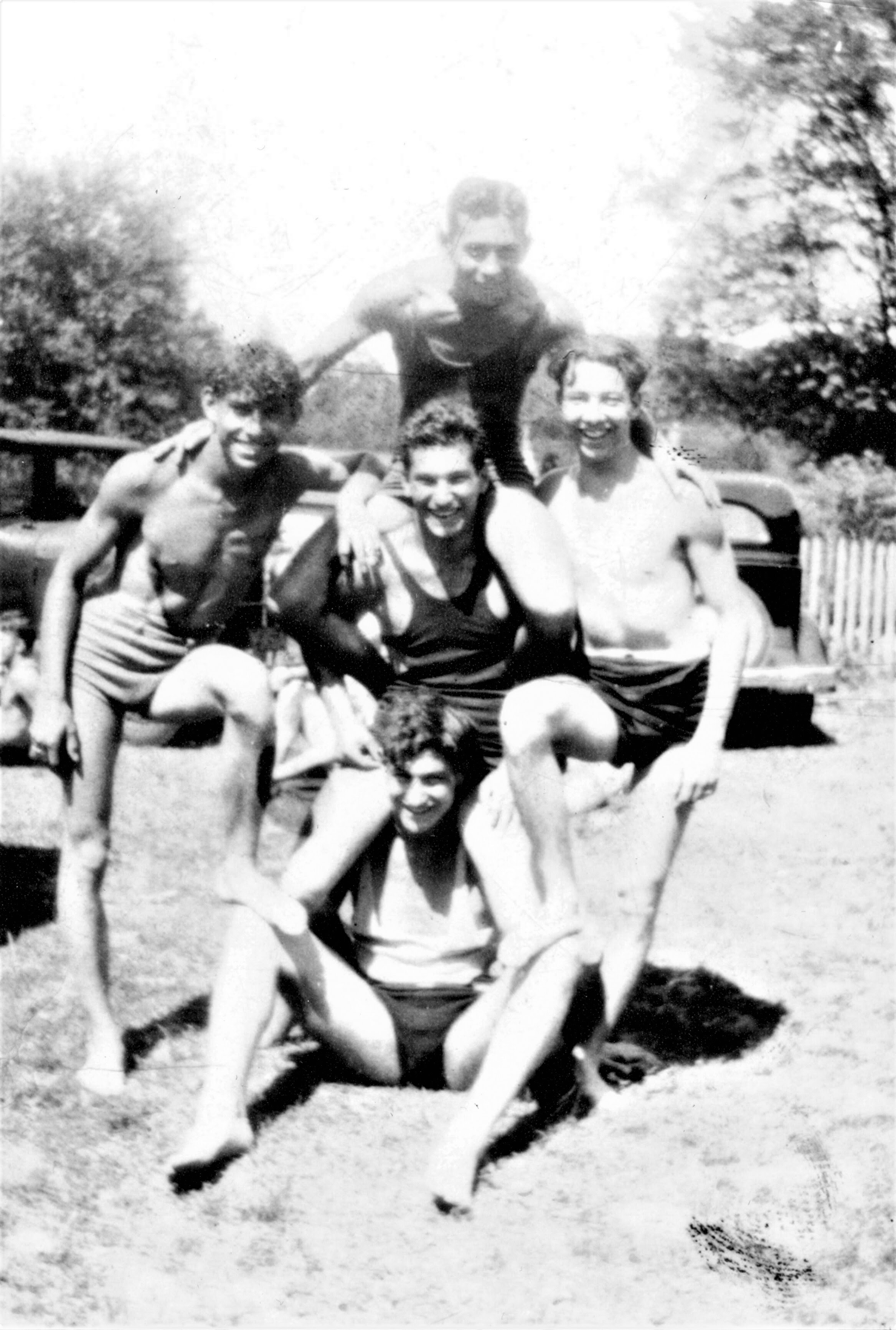 Bob Goldberg in the center and Harry Guon sitting on the bottom