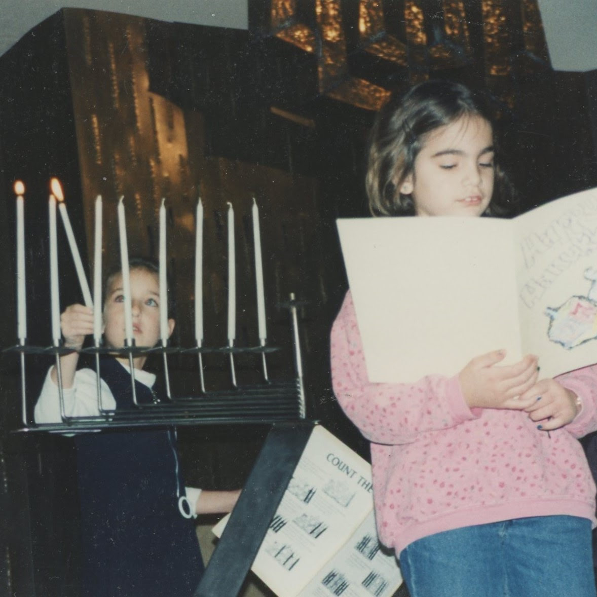 Lighting the candles and reading the story of Hanukkah at the Washington Township JCC