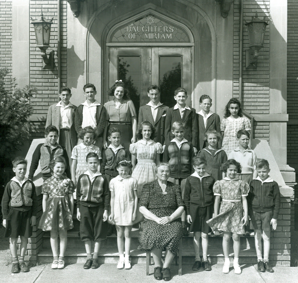 youngsters on front steps of Daughters of Miriam