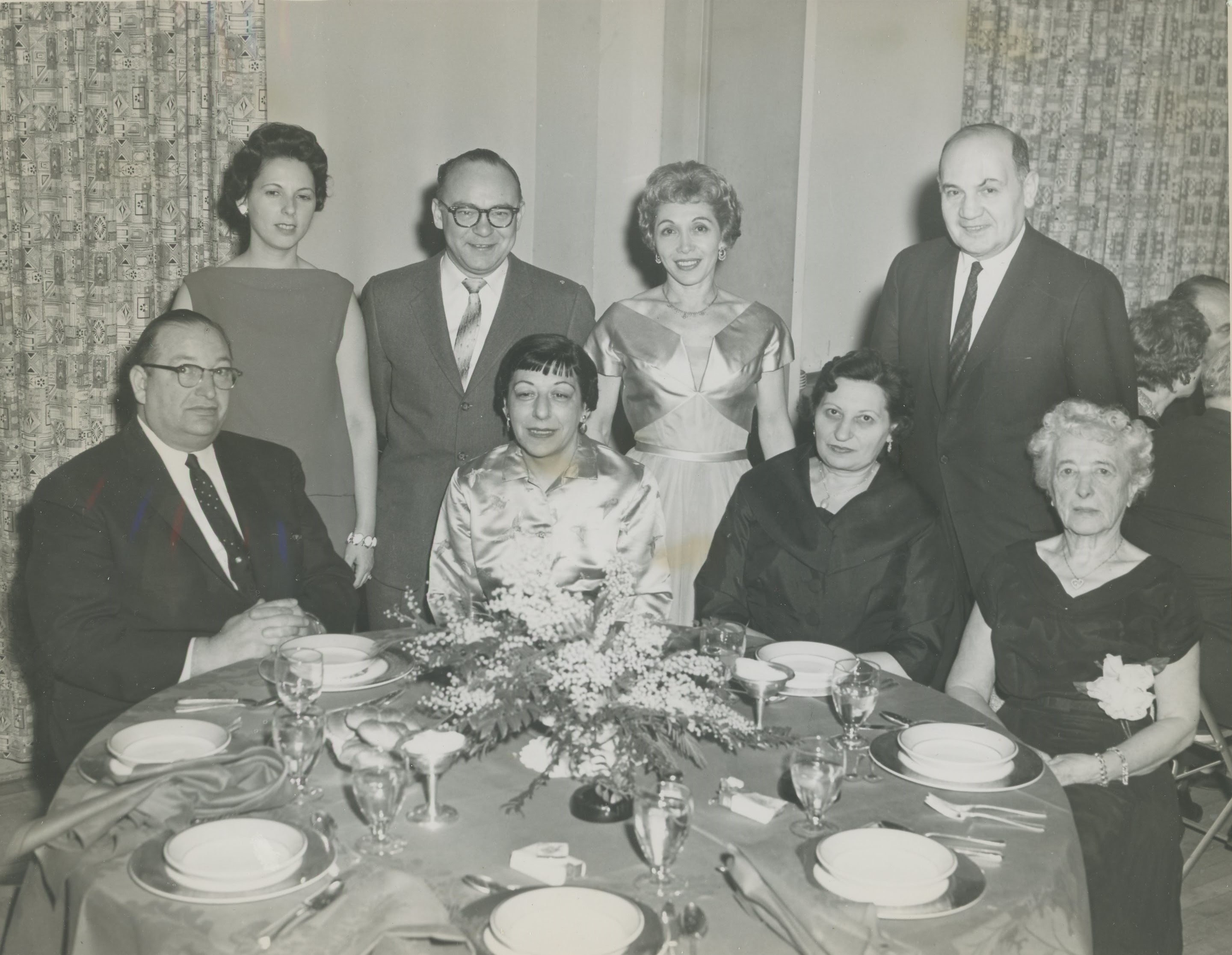 Passaic group sharing a meal