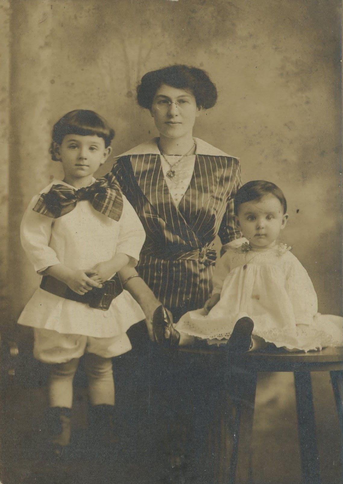 Unidentified mother and children