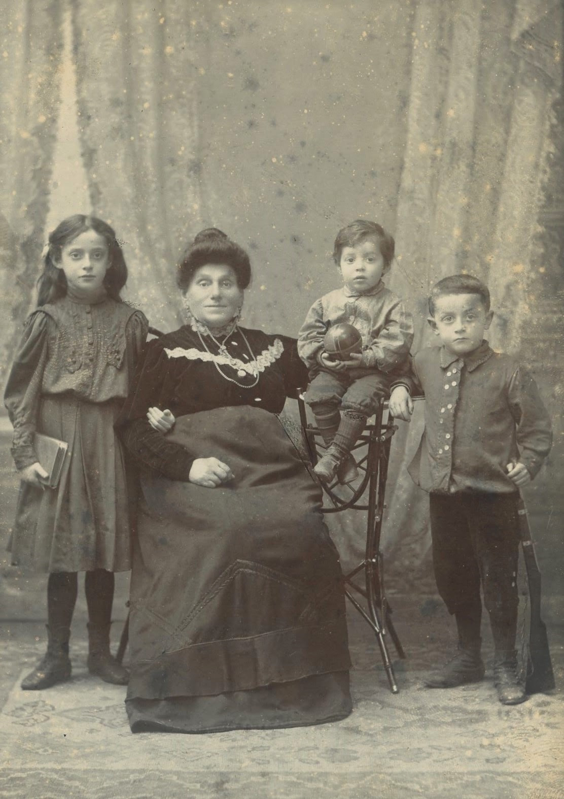 Unidentified mother and three children